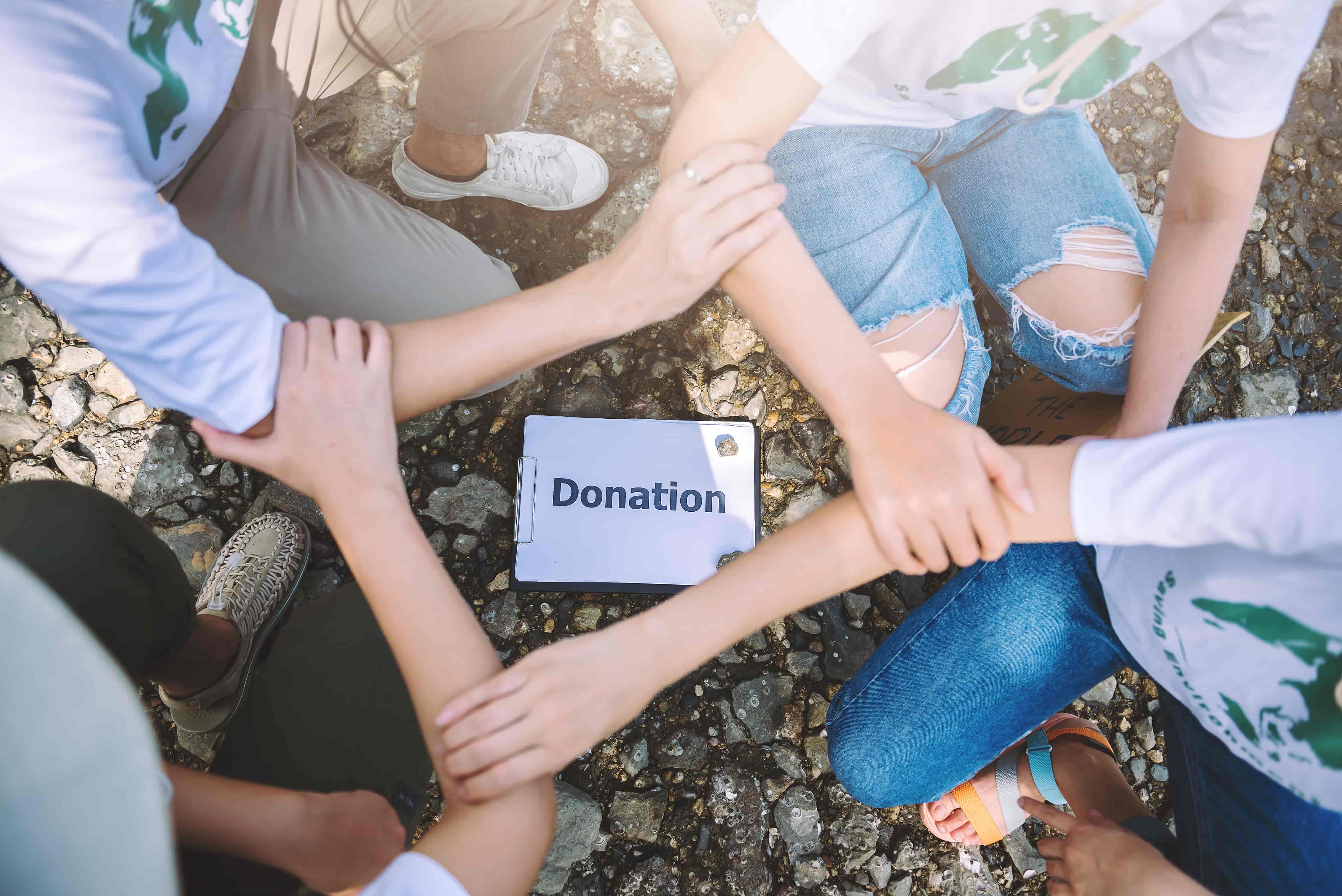 Close up people volunteer teamwork join hands together stack hands unity teamwork volunteering conceptual