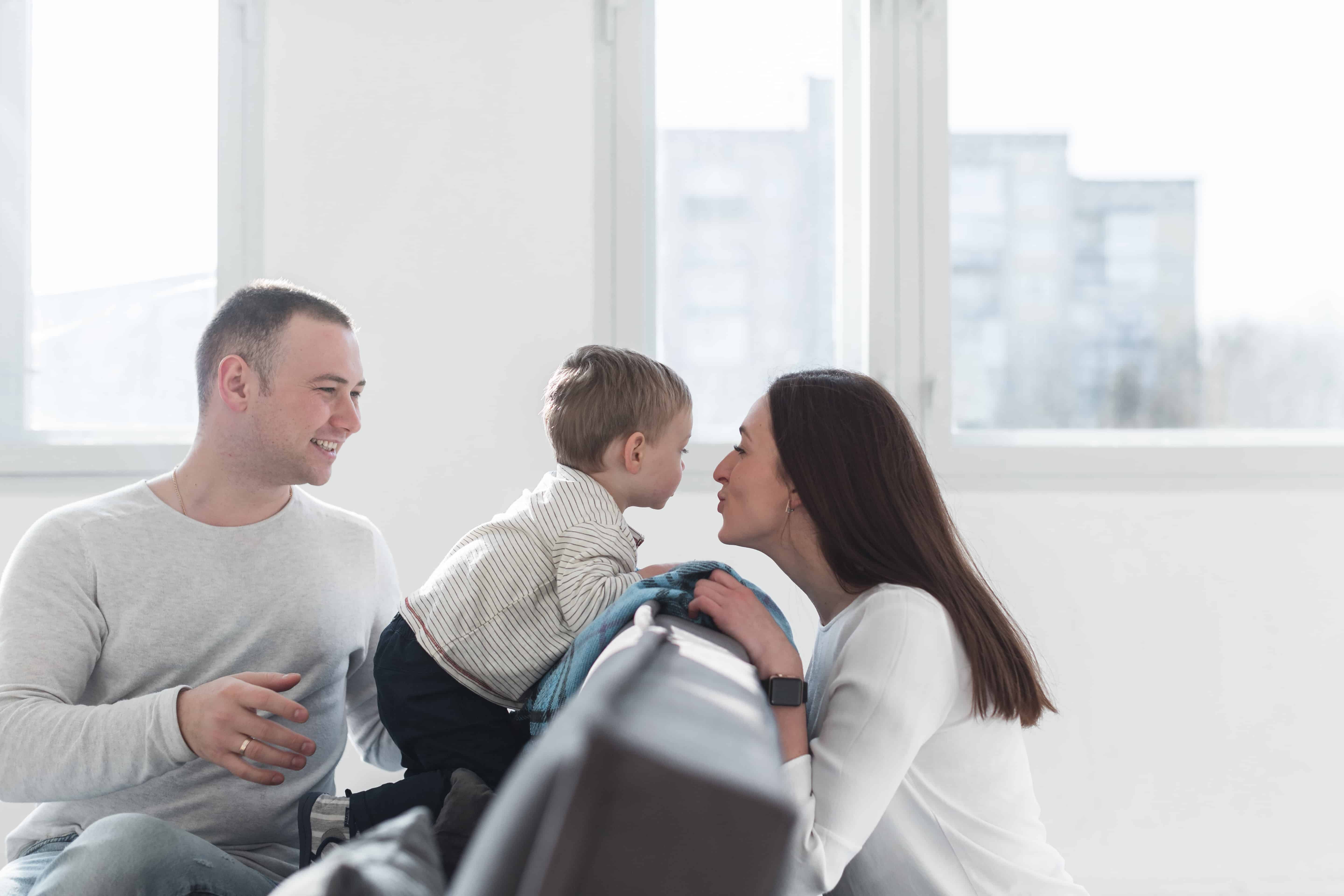 Happy parents home with baby